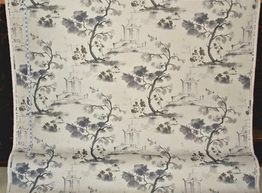 Fabric swatch with a blue and white tree pattern on a neutral background