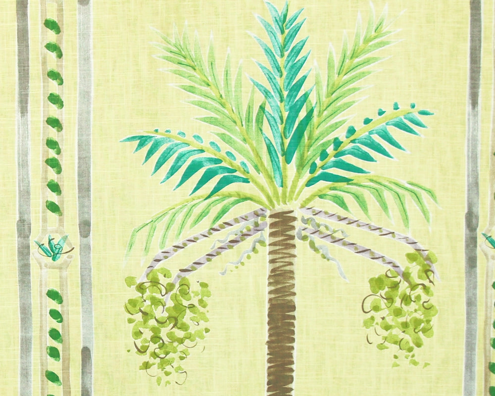 A close-up of a tropical fabric pattern featuring a palm tree with green and teal fronds, brown trunk, and green palm dates on a light yellow-green linen-textured background with vertical gray stripes.