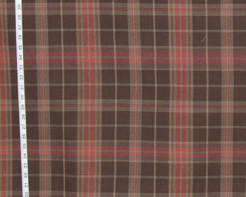 A traditional brown and red plaid fabric