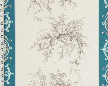 A close-up of a fabric or wallpaper pattern featuring a classic toile design with cherubs, floral bouquets, and a teal blue border with white scrollwork and a ruler scale on the left edge.