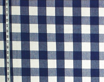 Blue and white checkered fabric with a ruler for scale