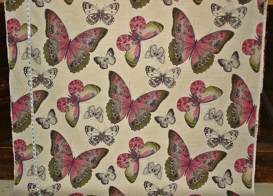 Fabric with a pattern of pink and green butterflies on a beige background