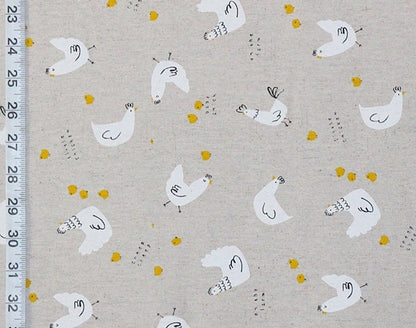 Fabric with chicken pattern and ruler on the side