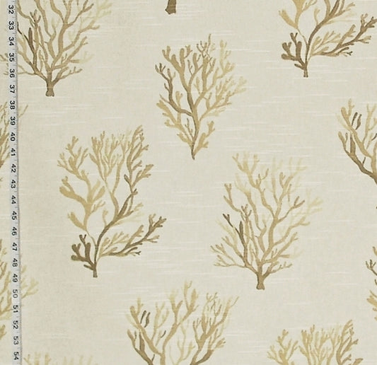 Fabric with beige coral pattern and a ruler for scale on a light background