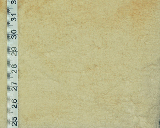 Beige faux fur fabric upholstery
