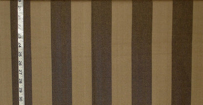 Striped fabric with brown and beige stripes and a ruler for scale.