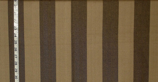 Striped fabric with brown and beige stripes and a ruler for scale.