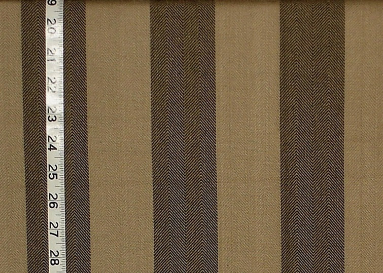Brown and beige striped fabric with a measuring tape on the left side