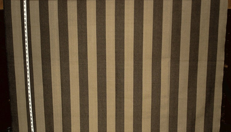Striped fabric with brown and beige stripes, measured by a ruler on the side.