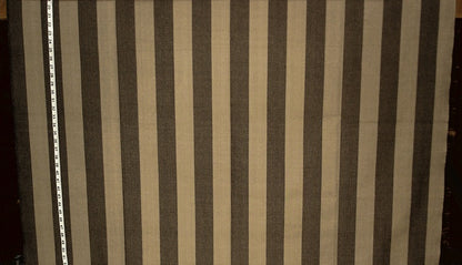 Striped fabric with brown and beige stripes, measured by a ruler on the side.