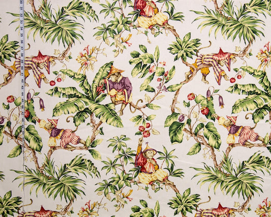 Tropical-themed fabric with monkeys, birds, and foliage on a beige background