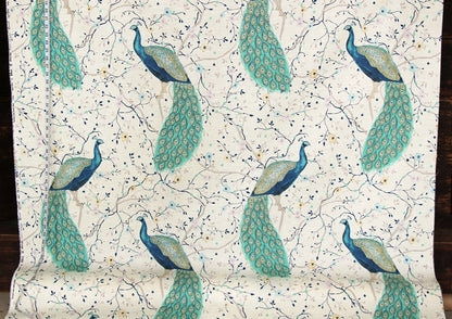 Fabric with peacock pattern on a white background
