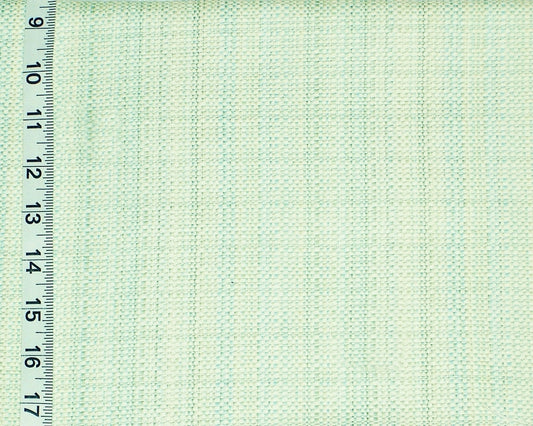 Textured green fabric with a ruler on the left side