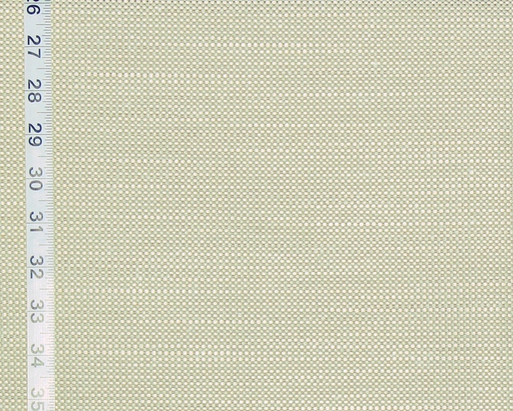 A close-up of a woven fabric texture in a light beige or cream color, with a white ruler along the left edge showing measurements in inches for scale.