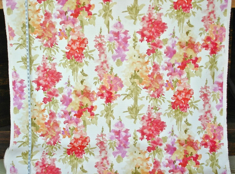 Floral fabric with a measuring tape on a white background