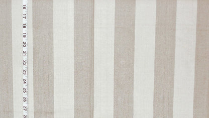 Striped fabric with a measuring tape on a white background