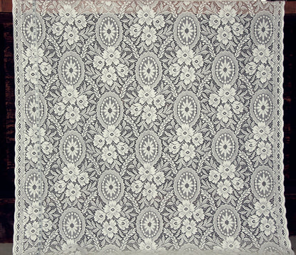 ivory colored lace fabric with flowers