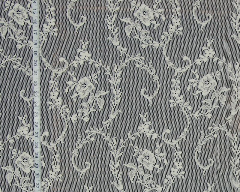 Scroll and rose Nottingham lace fabric